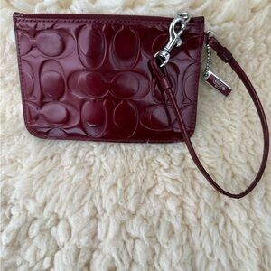 Coach Deep Red Embossed Wristlet